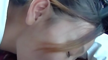 Asian student sucking