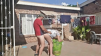 Outdoor fucking while taking off the laundry
